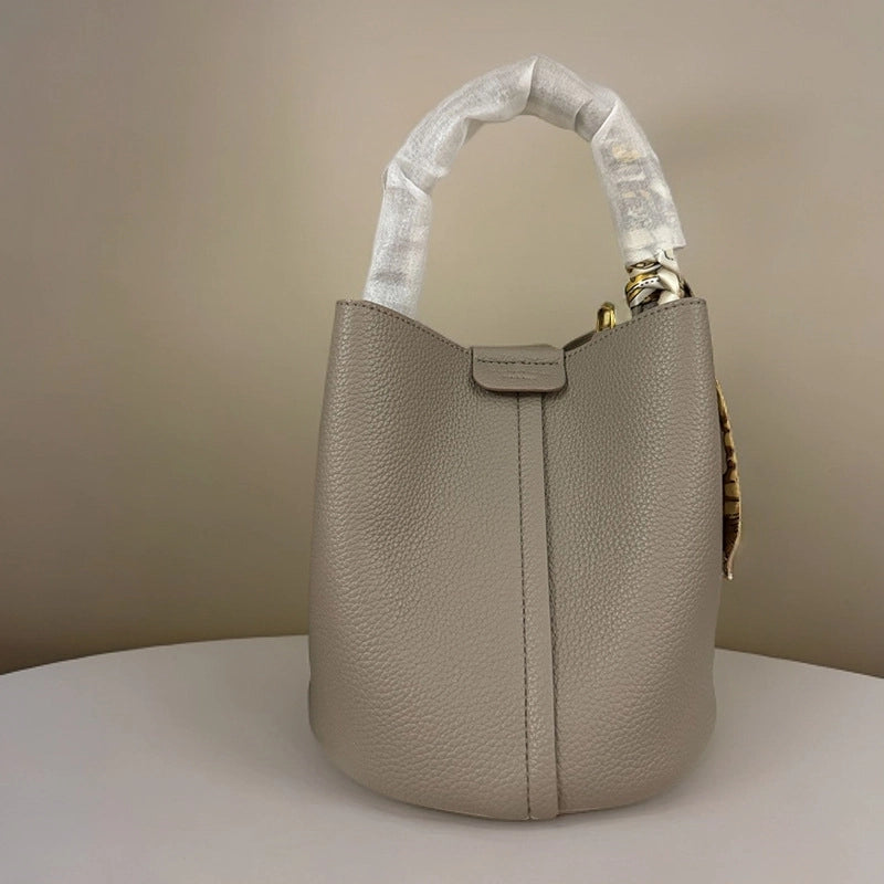 Women's Medium Leather Solid Color Elegant Bucket Open Bucket Bag