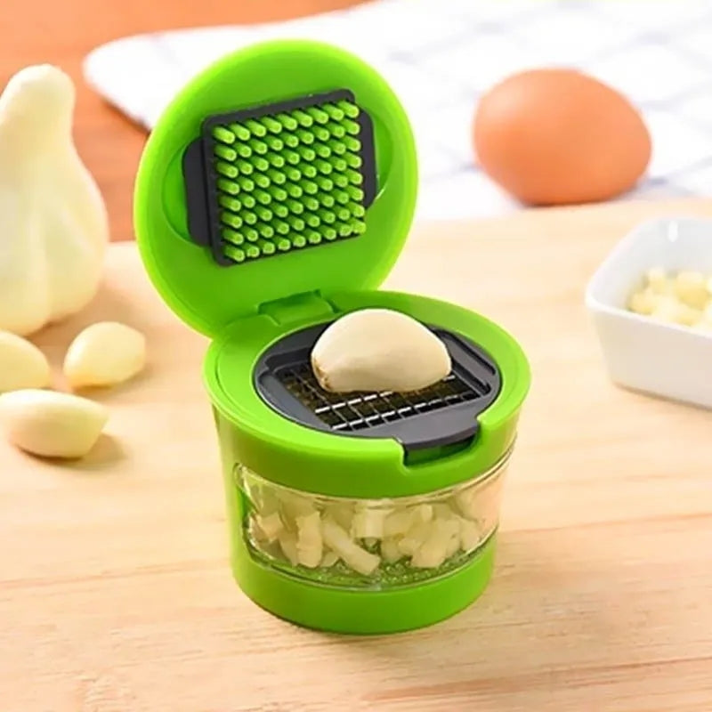 MINI GARLIC PRESSER