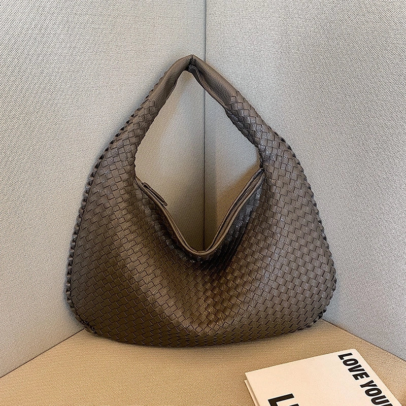 Women's Medium Pu Leather Solid Color Streetwear Weave Dumpling Shape Zipper Handbag