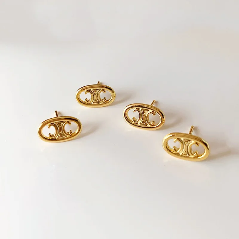 female delicate small Gold plated copper alloy hollowing triumphal arch stud earrings