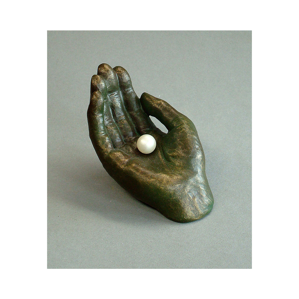 Hand With Pearl