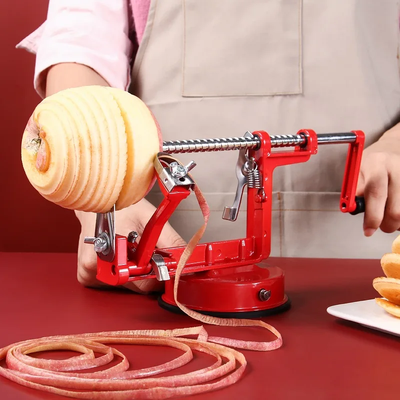 HAND CRANKED 3-IN-1 STAINLESS STEEL FRUIT PEELER. EASY TO USE AND REMOVE PITS