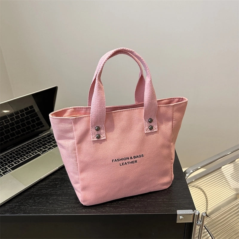 Women's Medium Canvas Letter Solid Color Basic Classic Style Zipper Handbag
