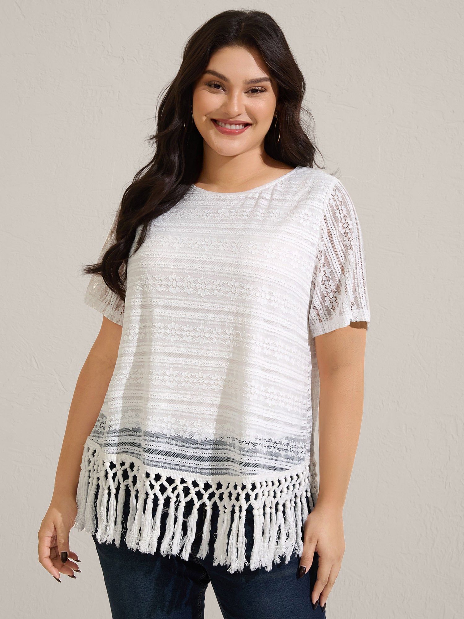 Stretchy Lace Tassel Hem Solid Top