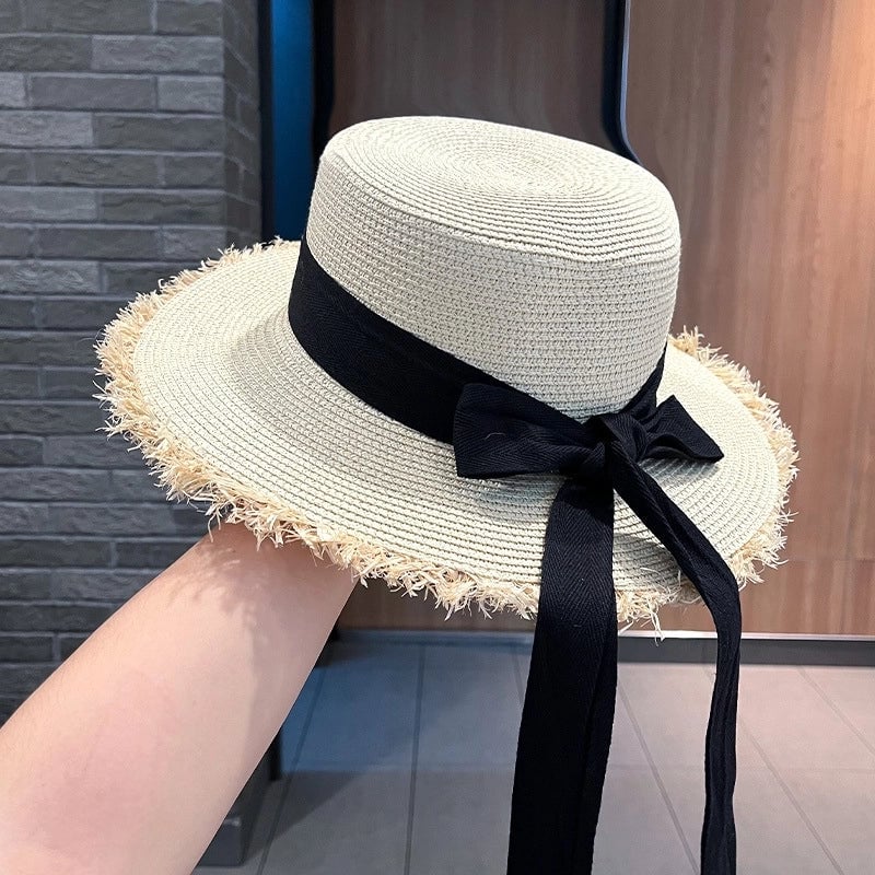 Women's Sweet Pastoral Solid Color Bowknot Wide Eaves Straw Hat