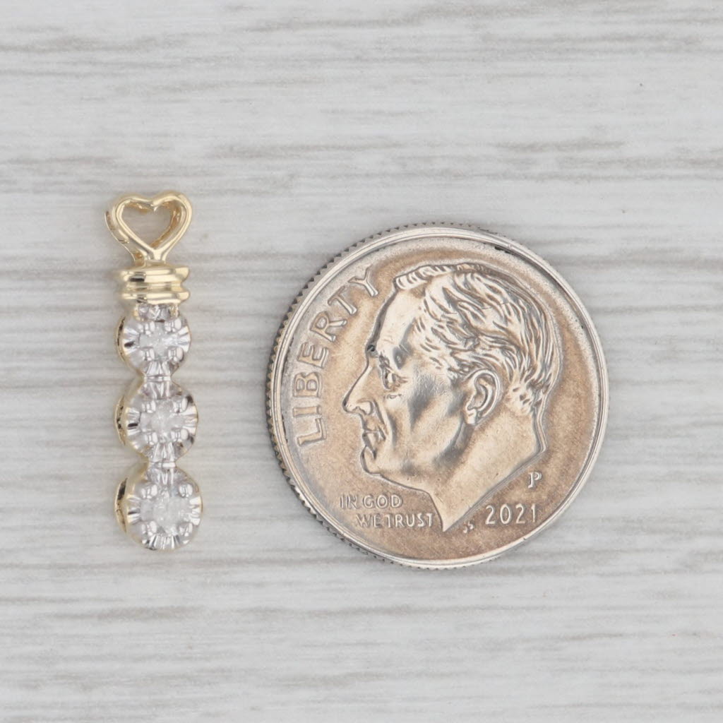 0.10ctw Diamond 3-Stone Journey Heart Pendant 10k Yellow Gold Small Drop