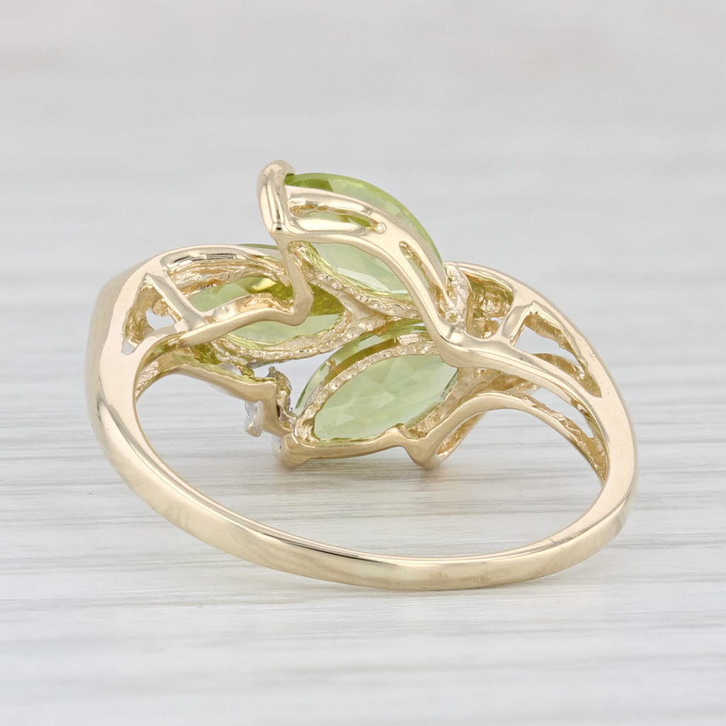 1.96ctw Peridot 3-Stone Ring 14k Yellow Gold Size 7.75 Diamond Accent