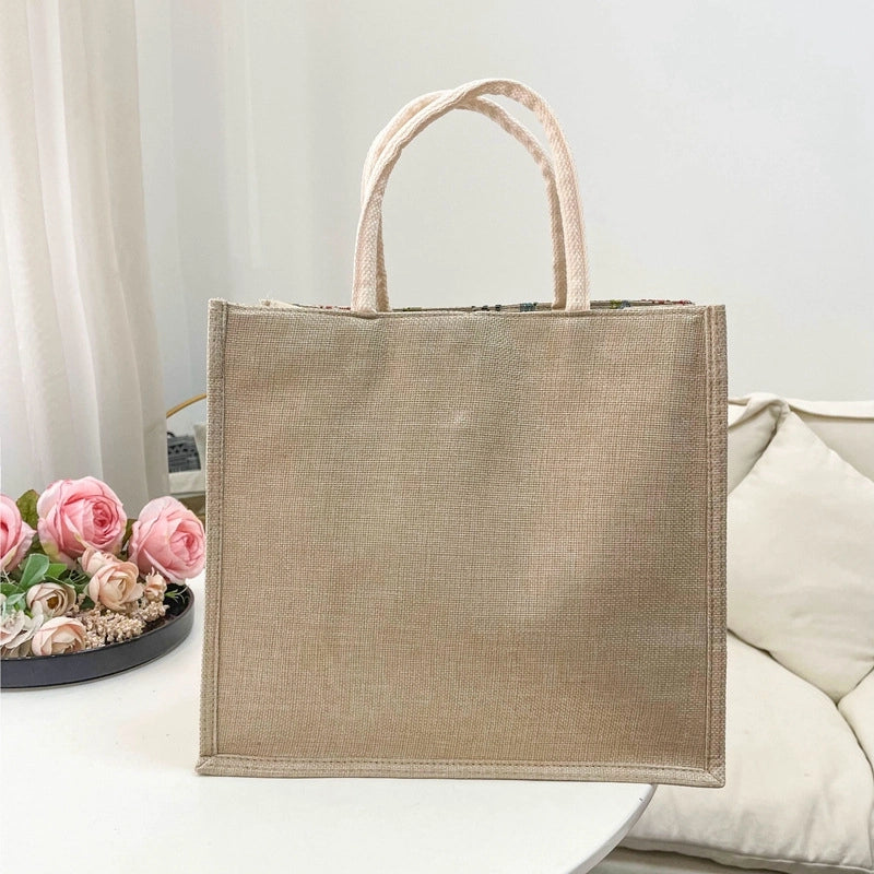 Women's Medium Cotton And Linen Letter Flower Streetwear Magnetic Buckle Tote Bag