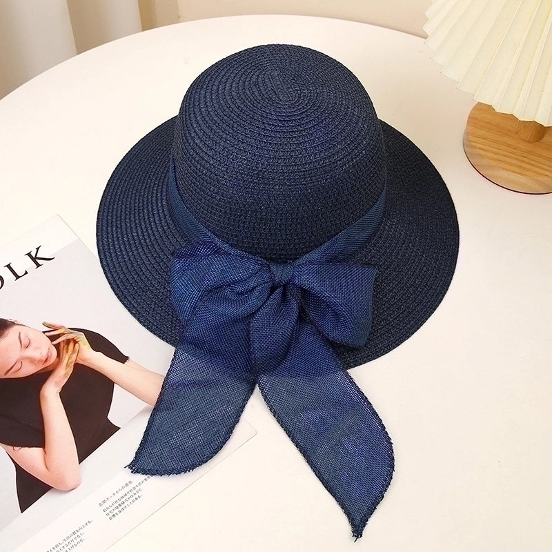 Women's Sweet Pastoral Solid Color Bowknot Wide Eaves Straw Hat