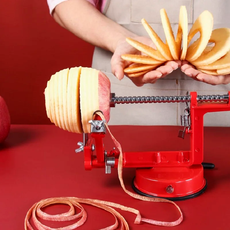 HAND CRANKED 3-IN-1 STAINLESS STEEL FRUIT PEELER. EASY TO USE AND REMOVE PITS