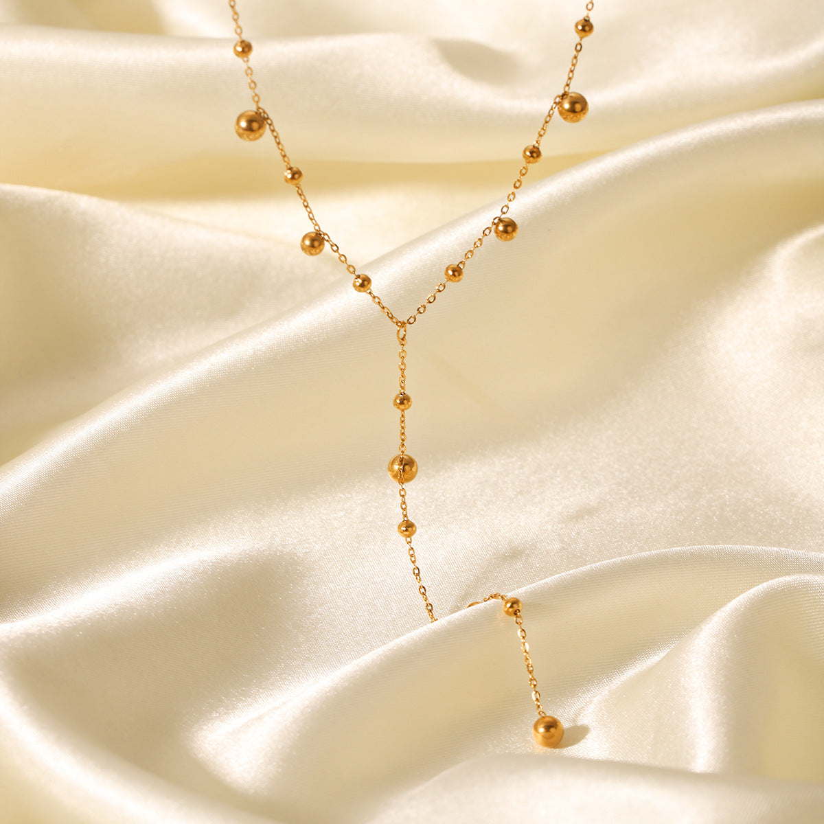 Ins Style Stainless Steel Y-Shaped Chain Necklace Design Round Bead Chain Small Gold Ball Pendant Necklace Titanium Steel Sweater Chain
