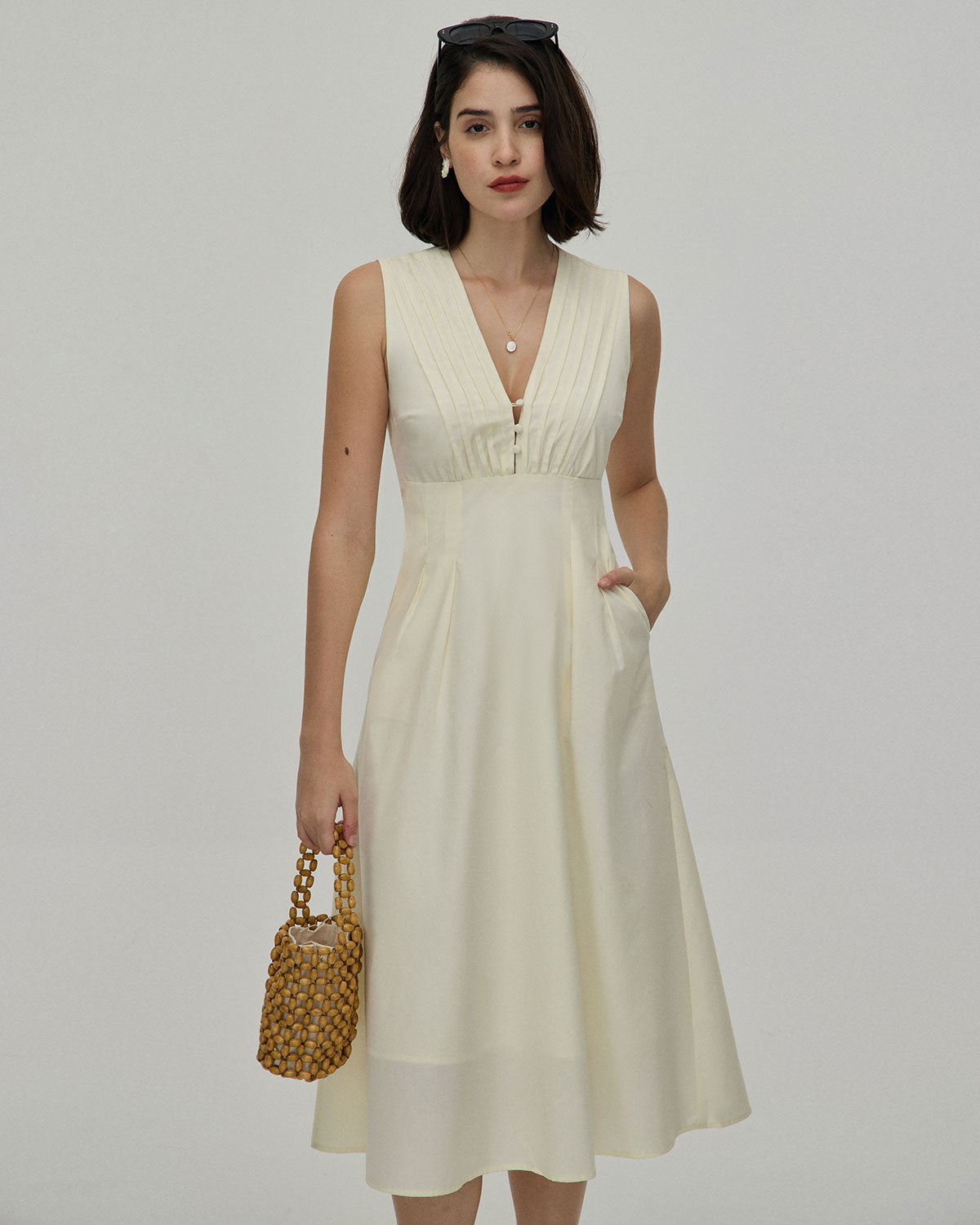 The Yellow V Neck Sleeveless Midi Dress