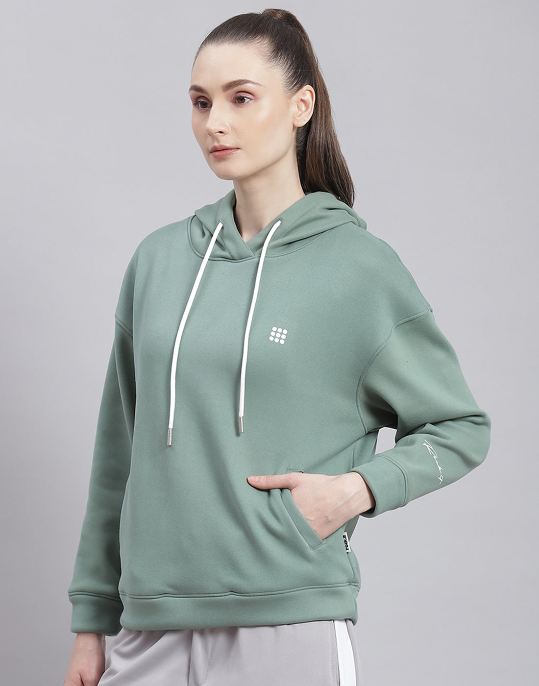 Women Green Solid Hooded Full Sleeve Sweatshirt