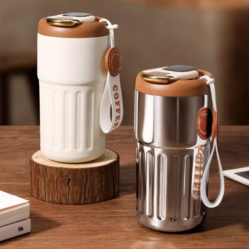 Coffee thermos mug with temperature display