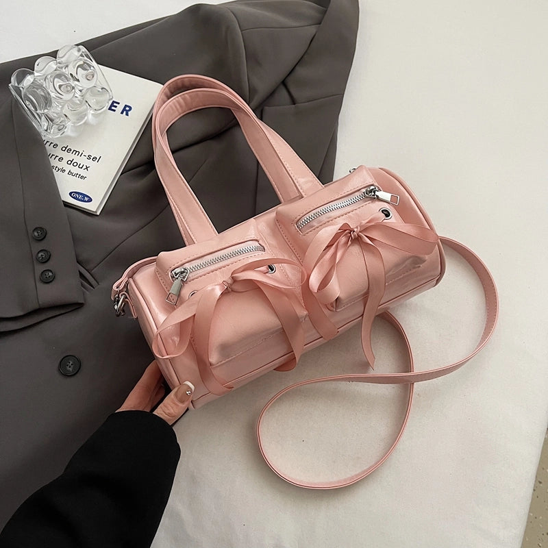Women's Pu Leather Solid Color Bow Knot Classic Style Cylindrical Zipper Crossbody Bag