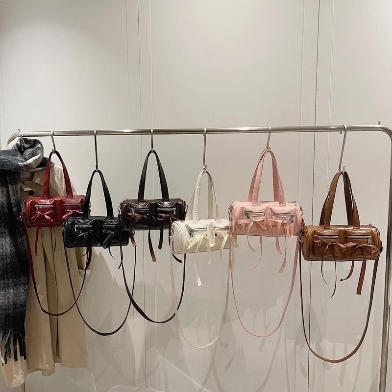 Women's Pu Leather Solid Color Bow Knot Classic Style Cylindrical Zipper Crossbody Bag