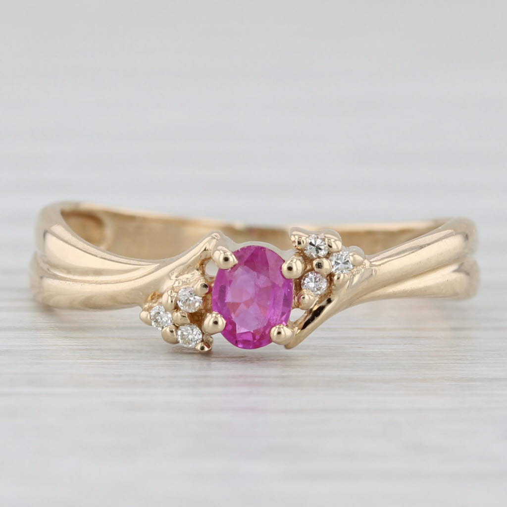 0.28ctw Oval Pink Sapphire Cubic Zirconia Ring 14k Yellow Gold Size 4.75