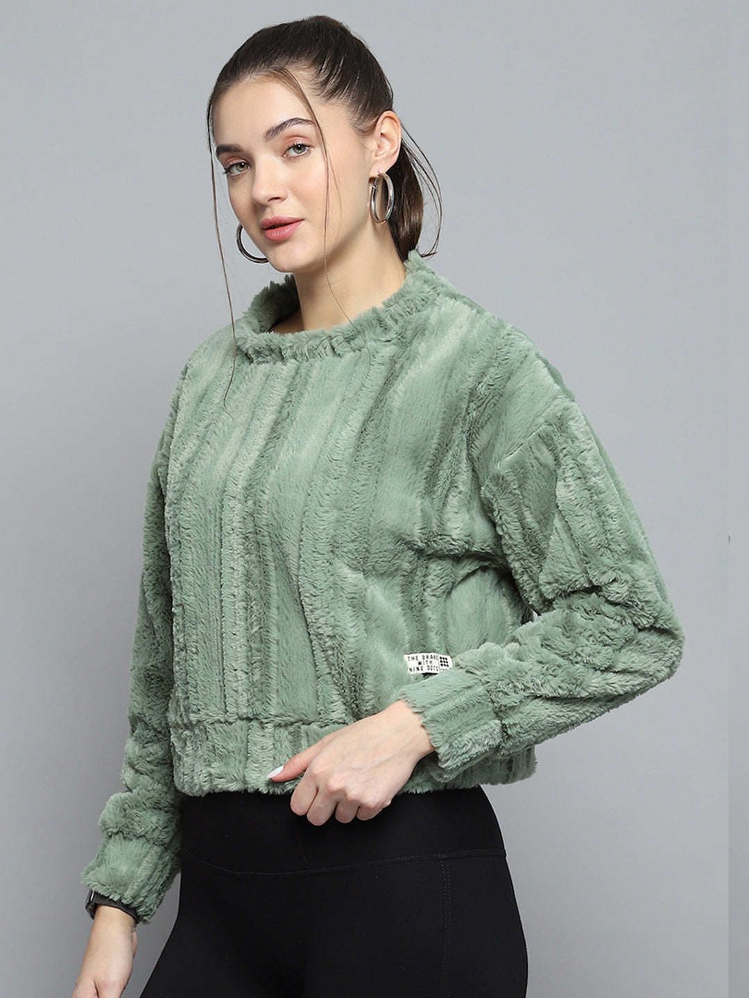 Women Green Solid Round Neck Full Sleeve Sweatshirt