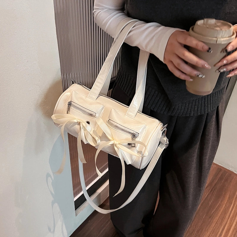 Women's Pu Leather Solid Color Bow Knot Classic Style Cylindrical Zipper Crossbody Bag