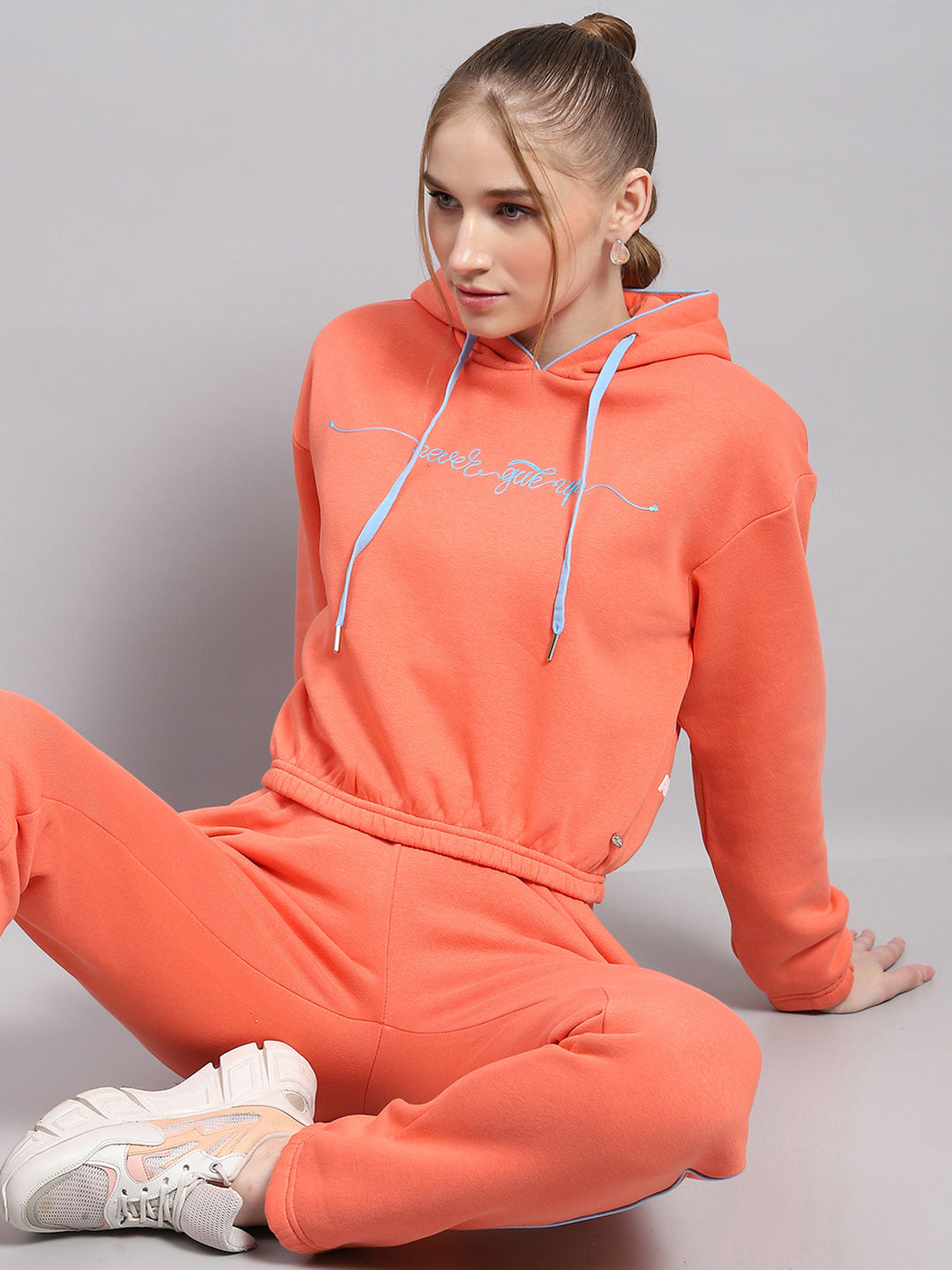 Women Peach Printed Hooded Full Sleeve Tracksuit