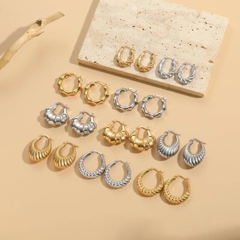 1 Pair Elegant Classic Style Stripe Oval Twist Hollow Out 304 Stainless Steel Earrings