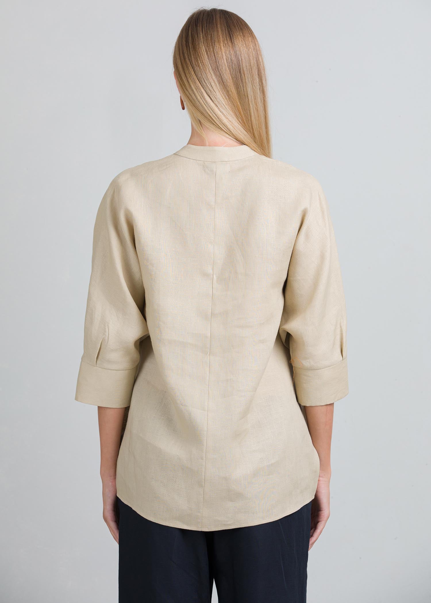 Oversized blouse with front pleat