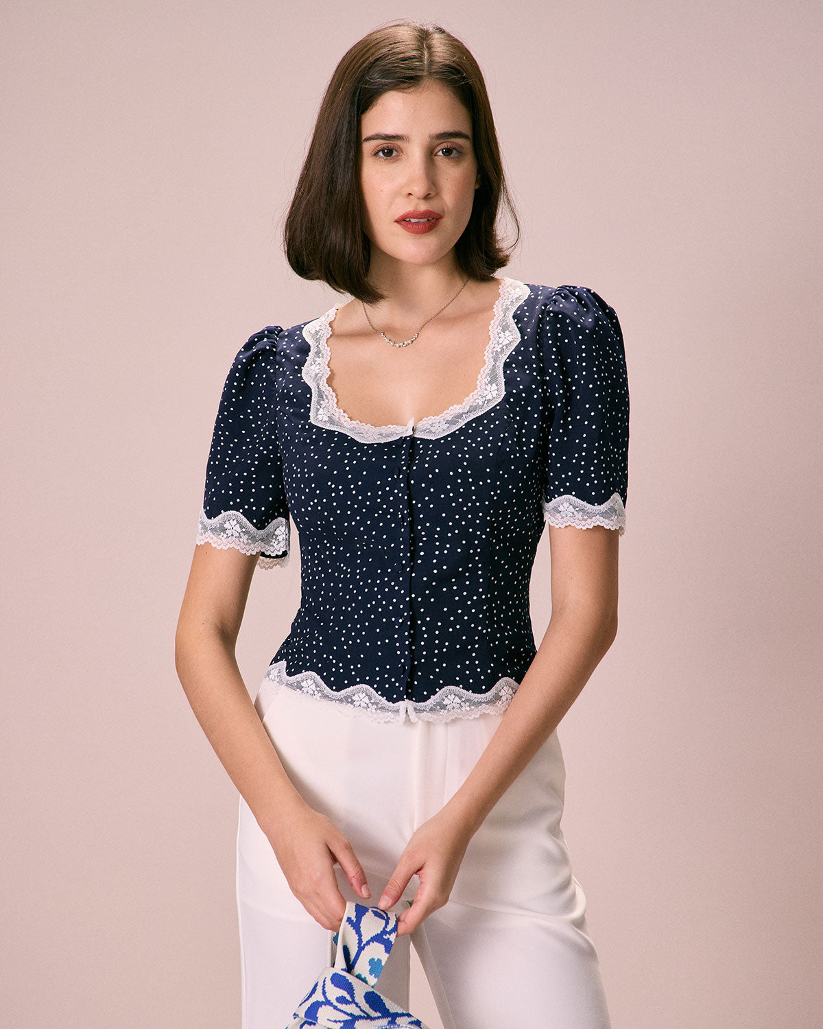 The Navy Polka Dot Lace Puff Sleeve Blouse