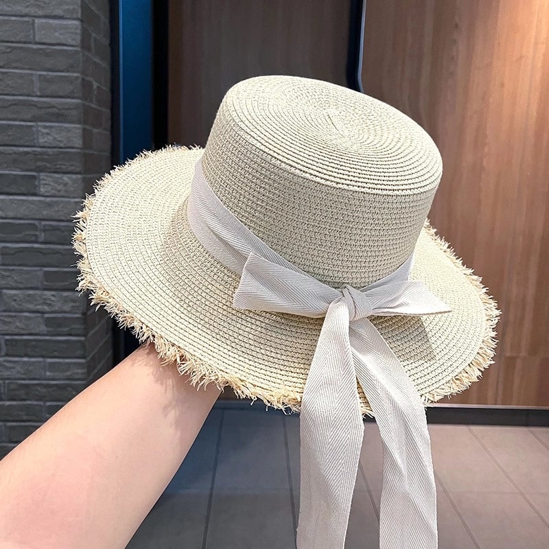Women's Sweet Pastoral Solid Color Bowknot Wide Eaves Straw Hat