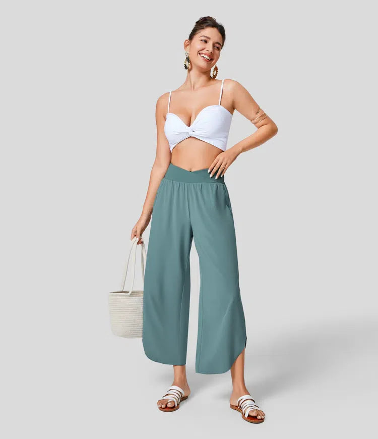 Breezeful™ crossover pants with high waistband and pleated side pockets