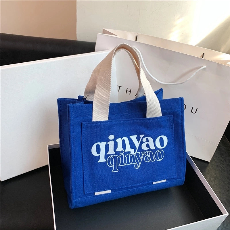 Women's All Seasons Canvas Letter Solid Color Preppy Style Classic Style Sewing Thread Square Hidden Buckle Shoulder Bag Canvas Bag Handbag