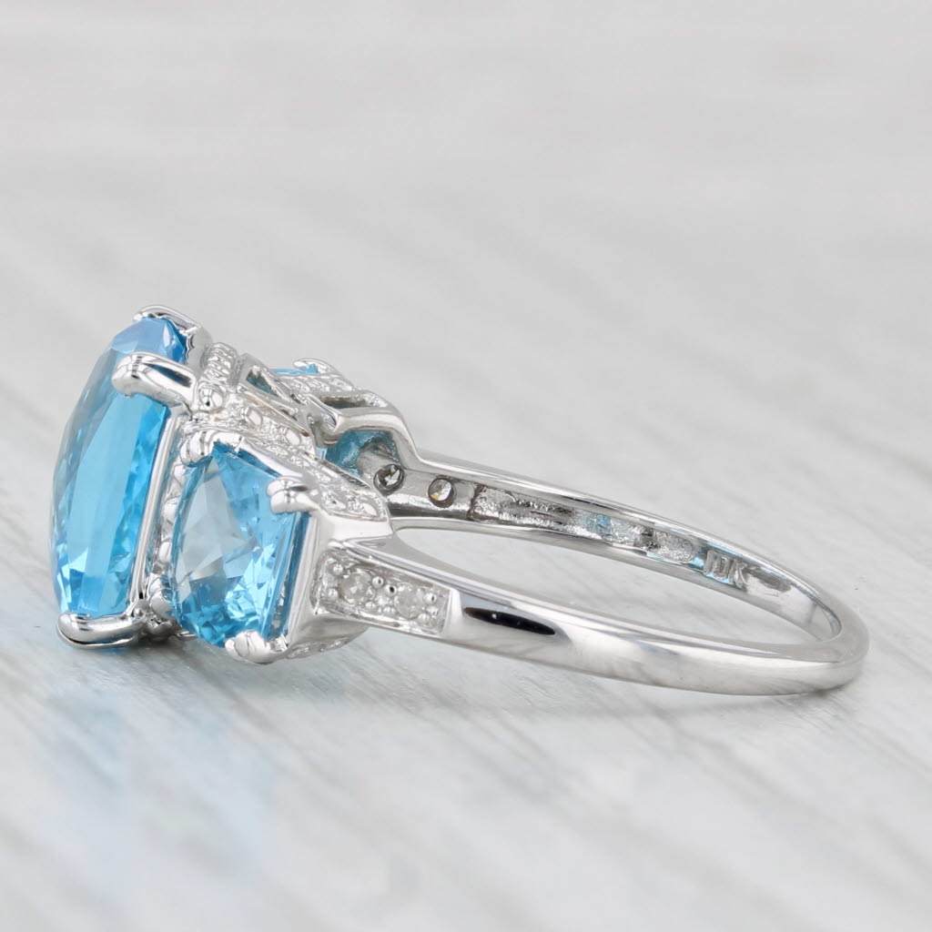 6.37ctw Blue Topaz 3-Stone Ring 10k White Gold Size 7 Diamond Accents