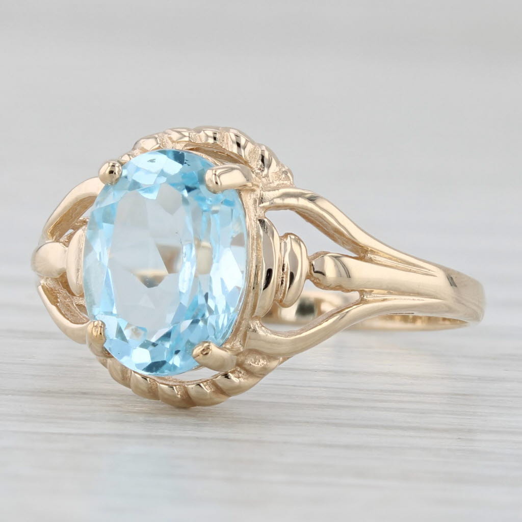2.15ctw Oval Blue Topaz Solitaire Ring 10k Yellow Gold Size 6.5