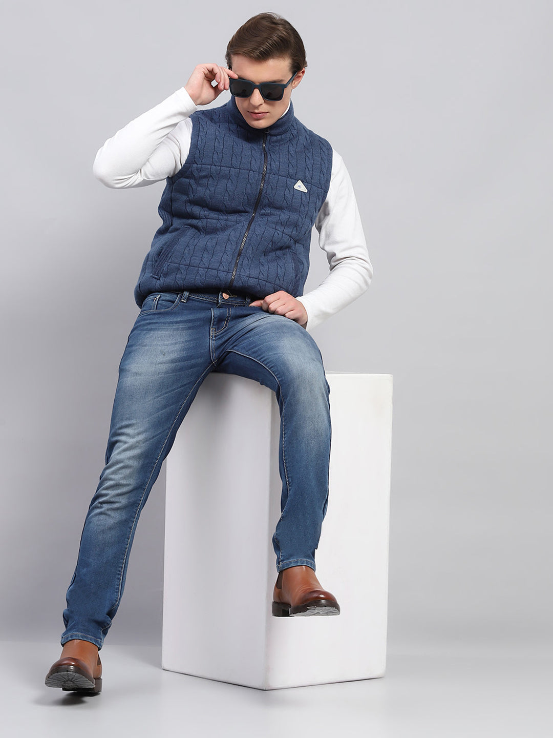 Men Blue Self Design Mock Neck Sleeveless Jacket