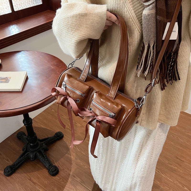 Women's Pu Leather Solid Color Bow Knot Classic Style Cylindrical Zipper Crossbody Bag