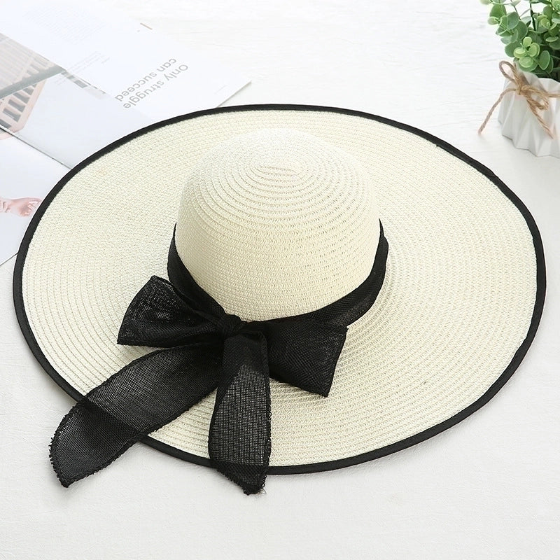 Women's Sweet Pastoral Solid Color Bowknot Big Eaves Straw Hat