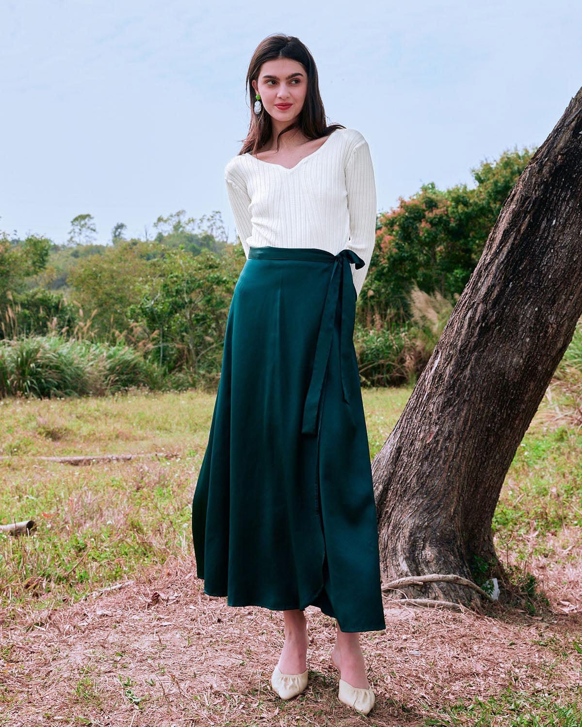 The White V Neck Teardrop Ribbed Knit Top