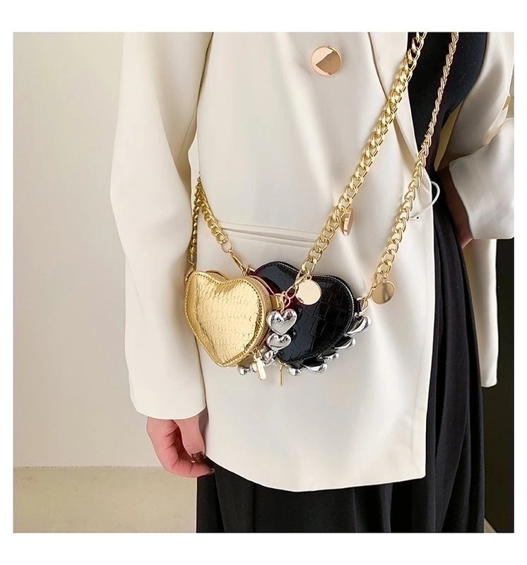 Women's Pu Leather Solid Color Fashion Heart-shaped Zipper Crossbody Bag