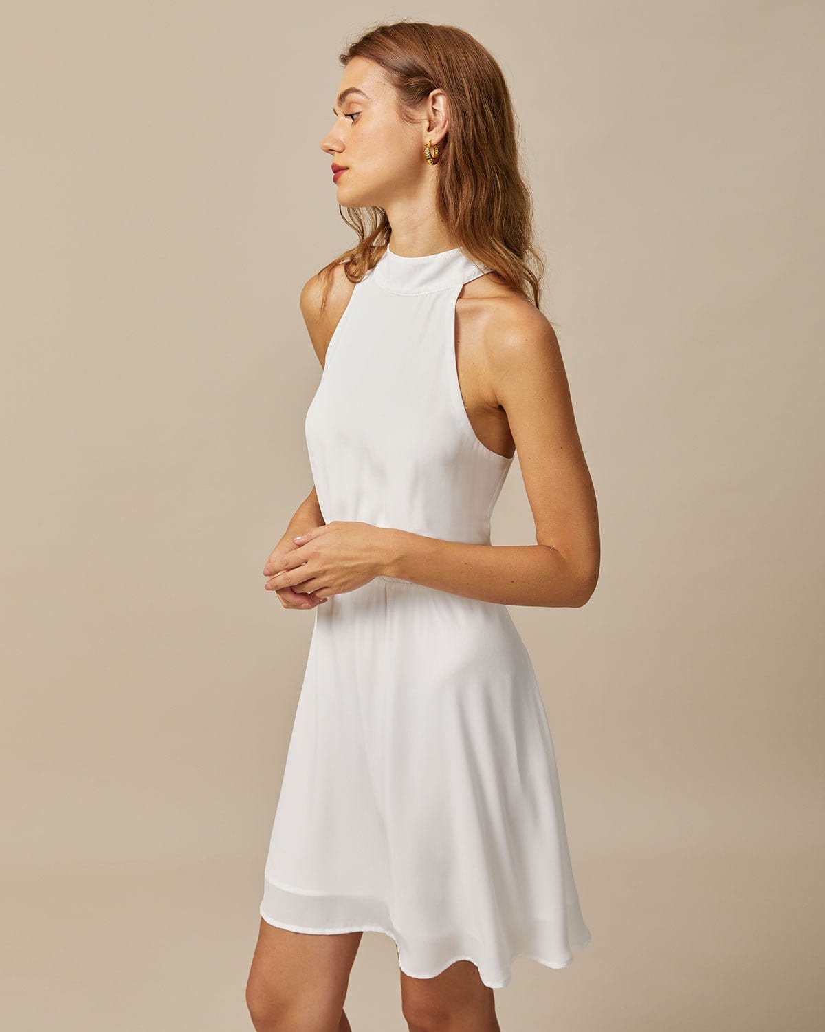 The White Mock Neck Pearls Backless Mini Dress