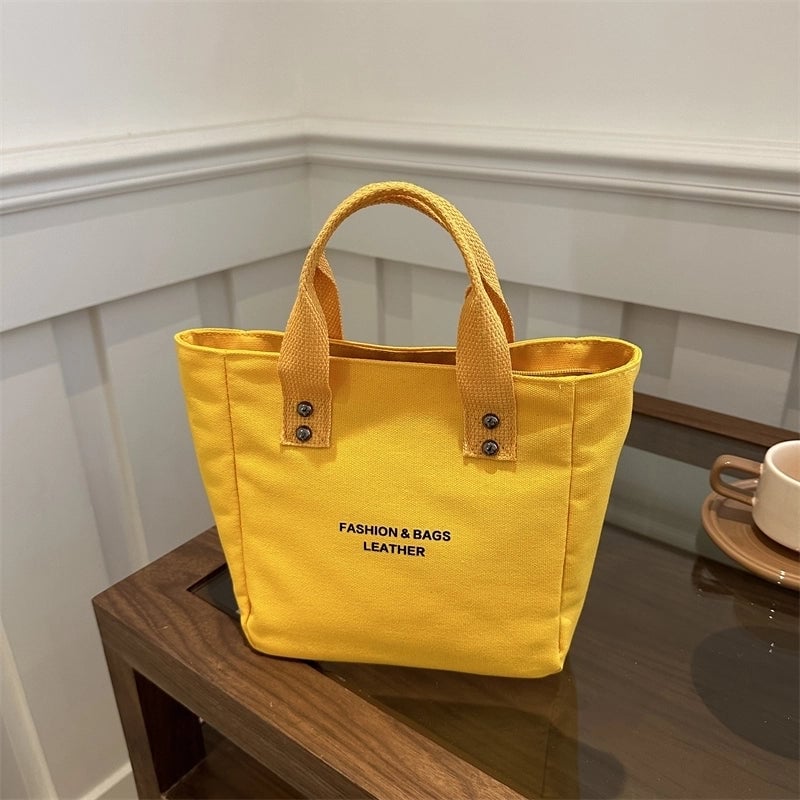 Women's Medium Canvas Letter Solid Color Basic Classic Style Zipper Handbag