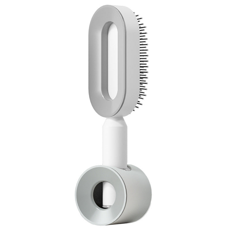 Self-cleaning hairbrush for women. One-button cleaning airbag to prevent hair loss