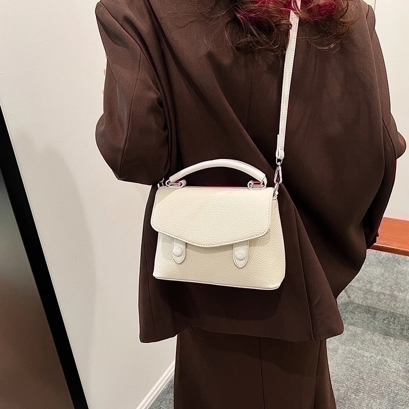 Women's Pu Leather Solid Color Classic Style Sewing Thread Zipper Flip Cover Handbag