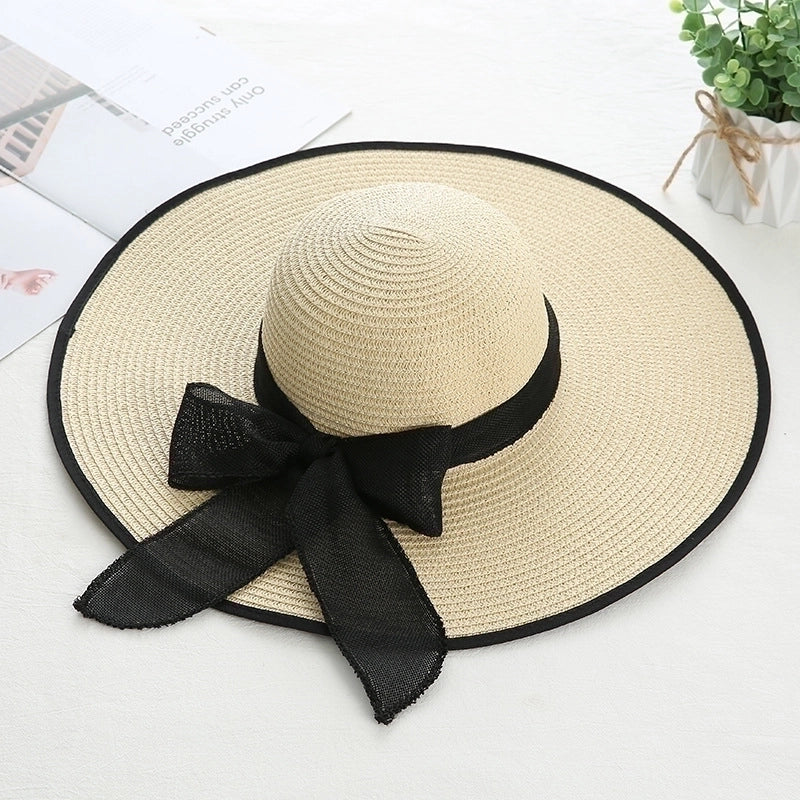 Women's Sweet Pastoral Solid Color Bowknot Big Eaves Straw Hat