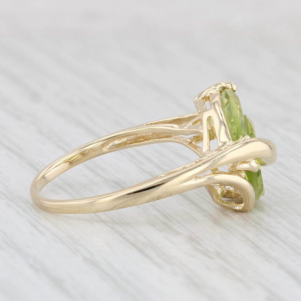 1.96ctw Peridot 3-Stone Ring 14k Yellow Gold Size 7.75 Diamond Accent