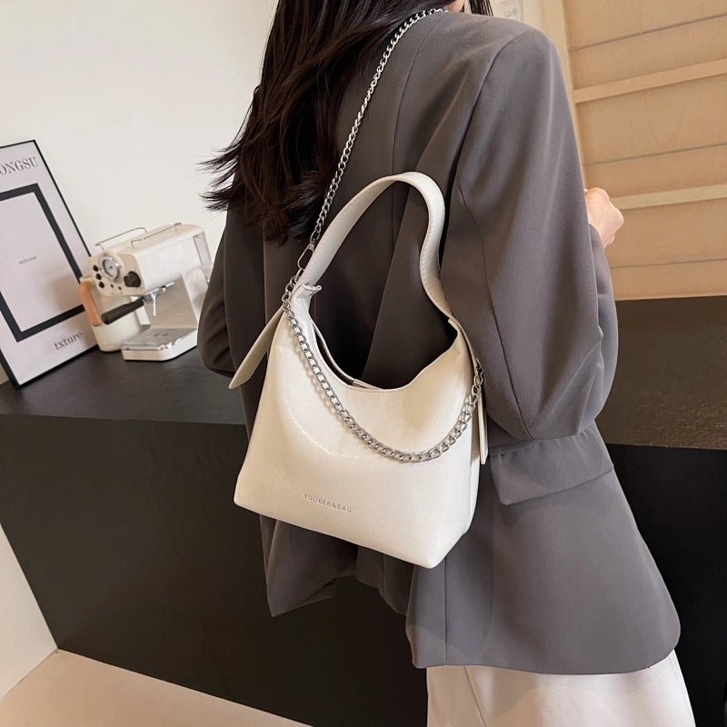 Women's Medium Pu Leather Solid Color Classic Style Streetwear Sewing Thread Pillow Shape Magnetic Buckle Crossbody Bag