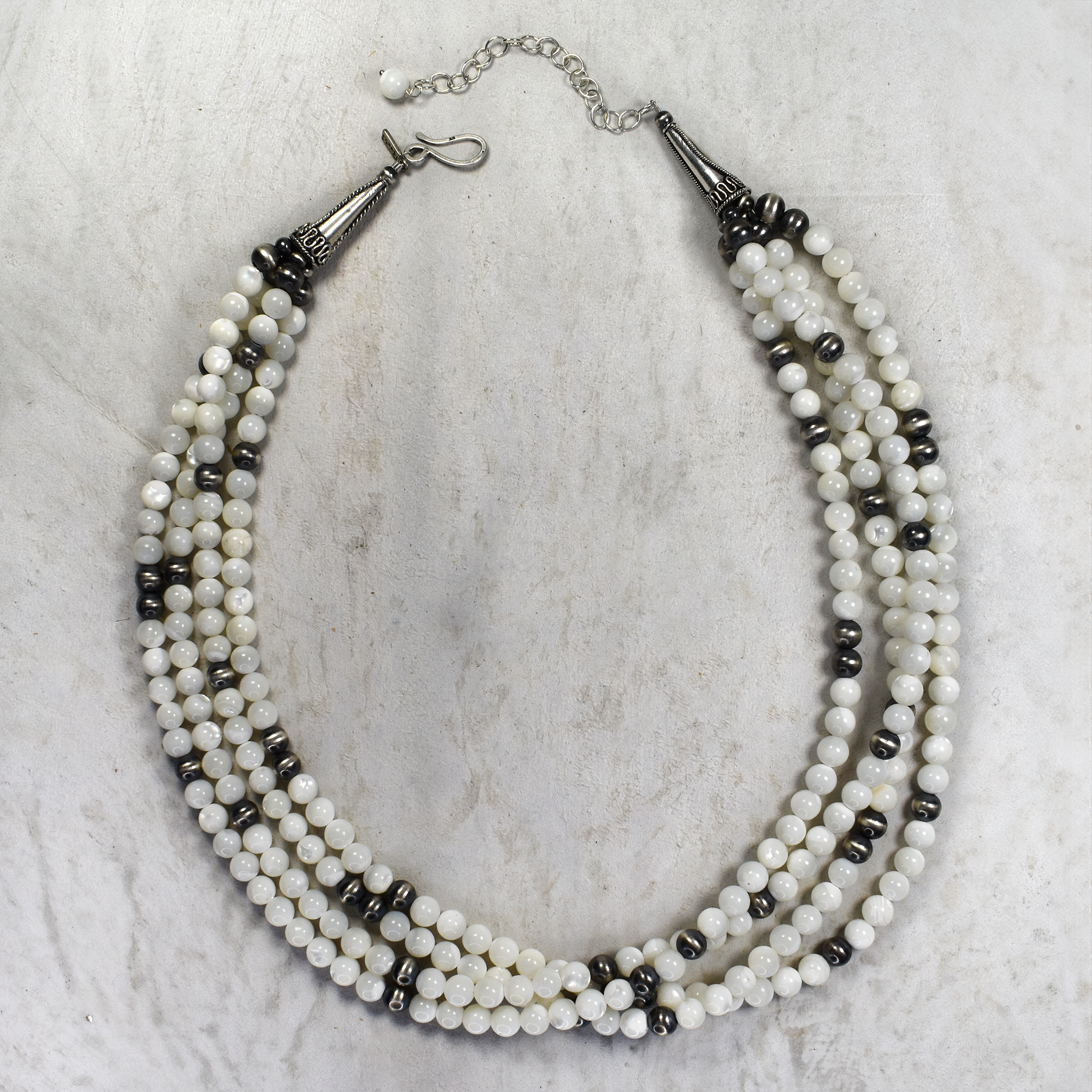 22 Mother of Pearl and Sterling Silver Four Strand Necklace
