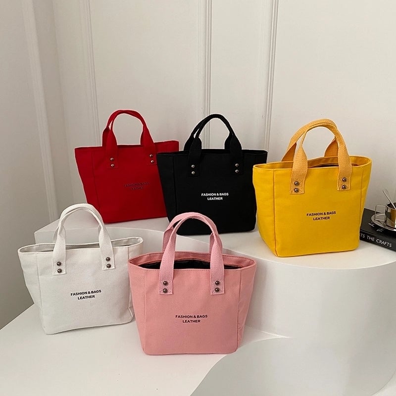 Women's Medium Canvas Letter Solid Color Basic Classic Style Zipper Handbag
