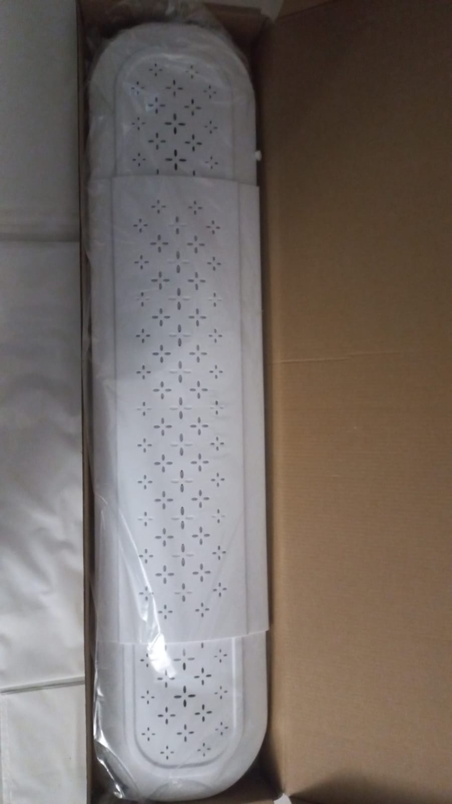AIR CONDITIONING DEFLECTOR