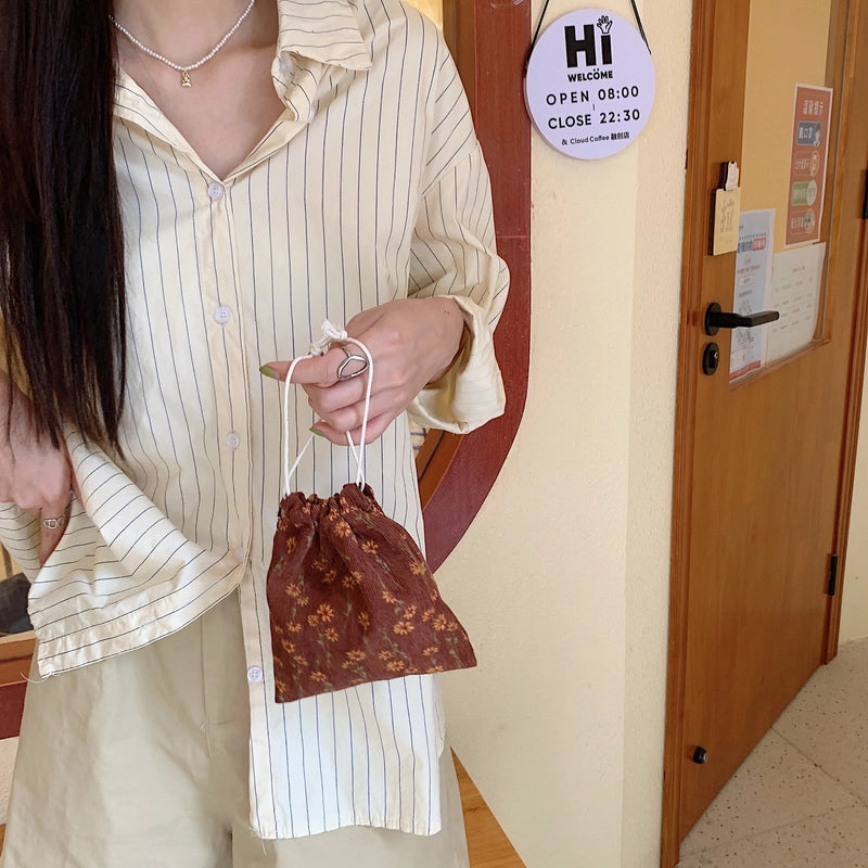Unisex Small Polyester Plaid Flower Streetwear Bucket String Handbag