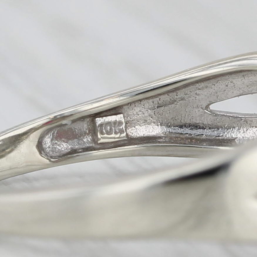 0.75ctw Oval Ruby Diamond Halo Ring 10k White Gold Size 7