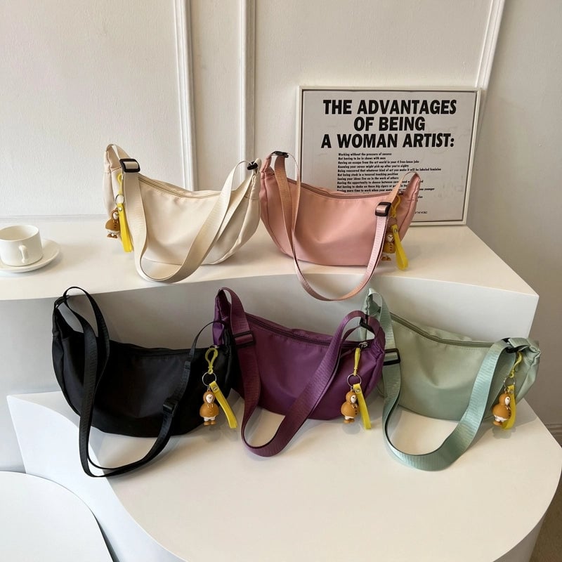 Women's Oxford Cloth Solid Color Streetwear Ornament Dumpling Shape Zipper Crossbody Bag